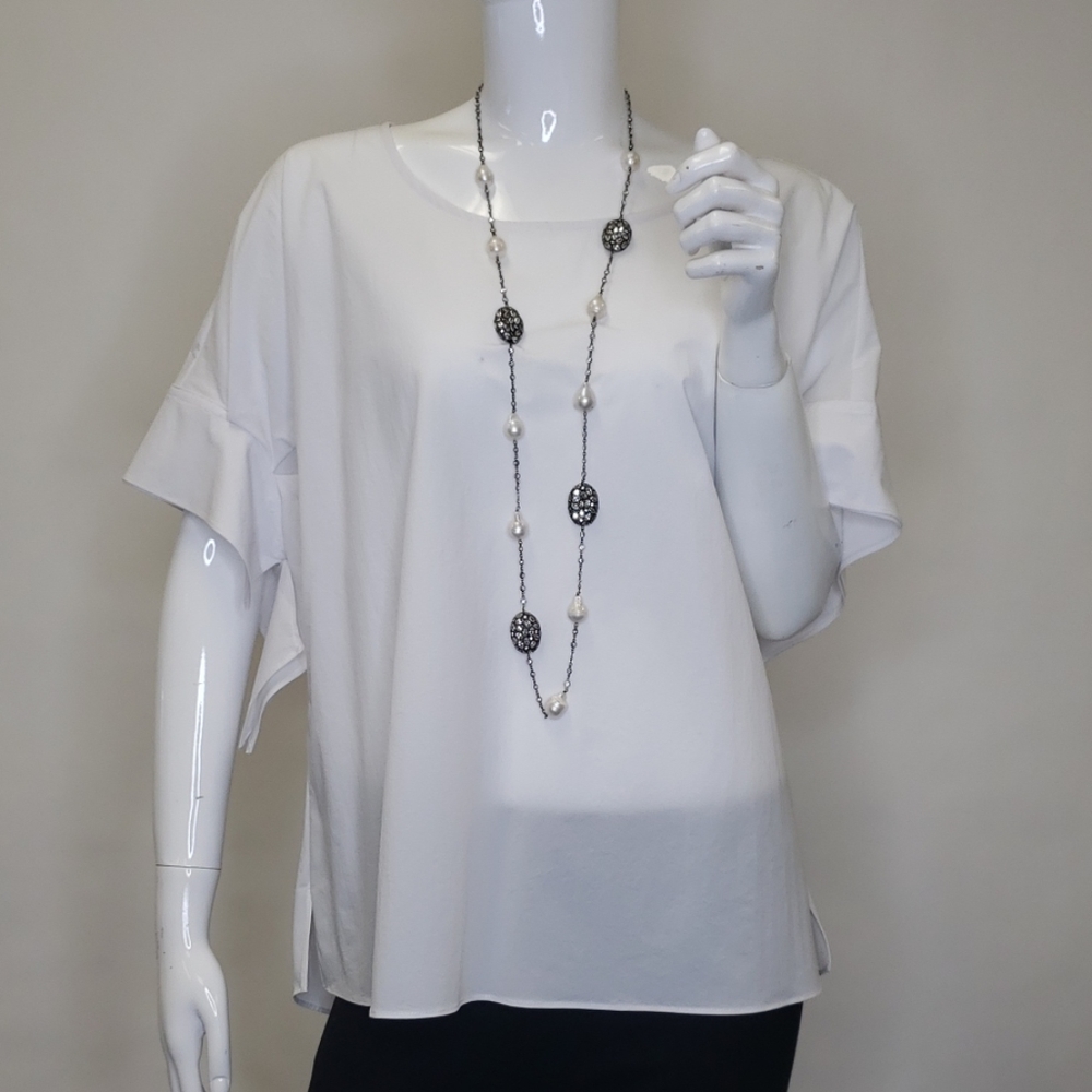 Pleated sleeve top.
